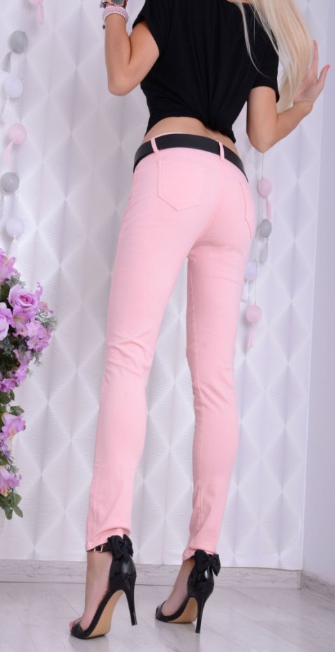 Pudrowe jeansy różowe z dziurami P361 Pudrowe jeansy różowe z dziurami P361